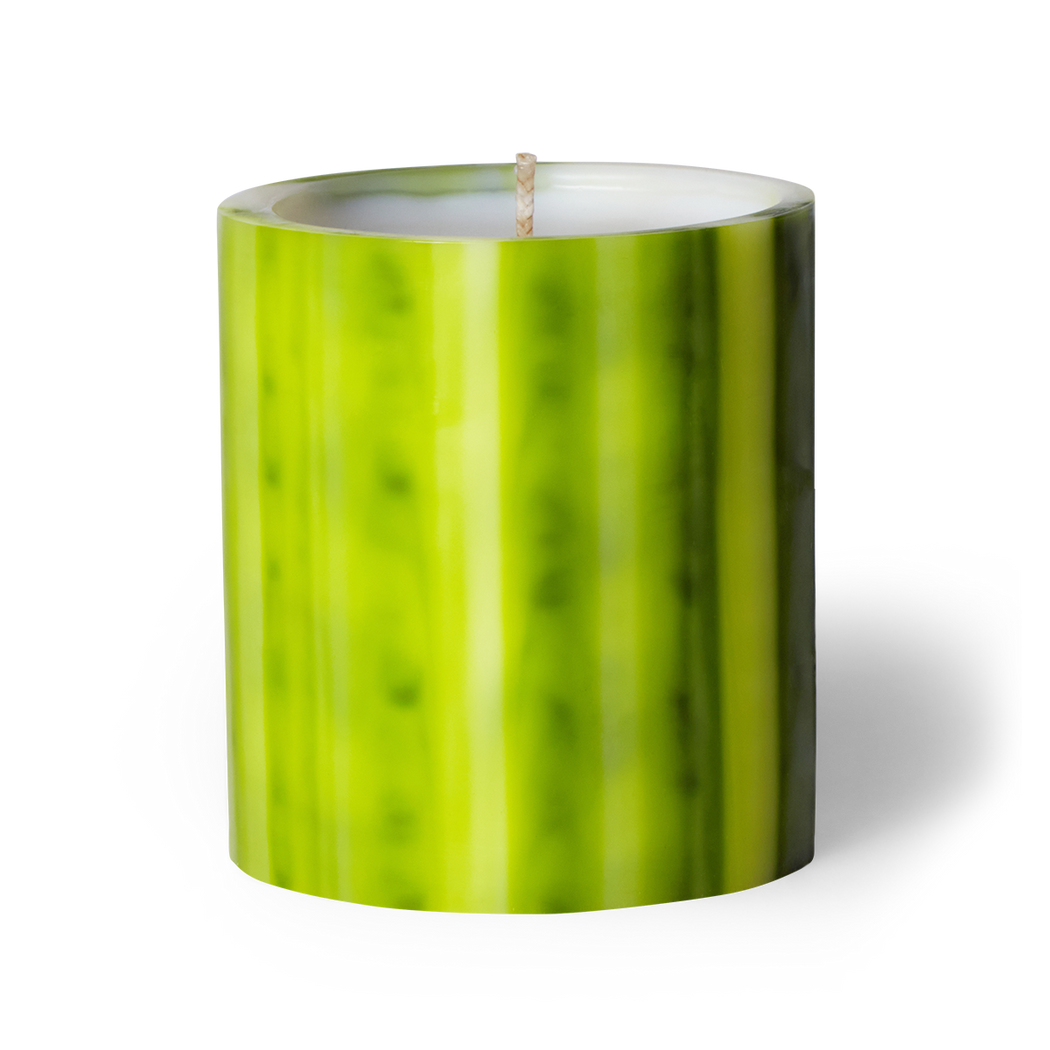 Experience the Chartreuse Artisanal candle by Le Feu De L'eau, blending cassia bark, sandalwood, and frankincense for a mystical sensory journey. Crafted underwater from wax, each candle is a unique creation. Hand-poured in LA with cocunut wax and natural fragrance. Enjoy 75 hours of burn time. Image of candle in lime green colored wax vessel. 