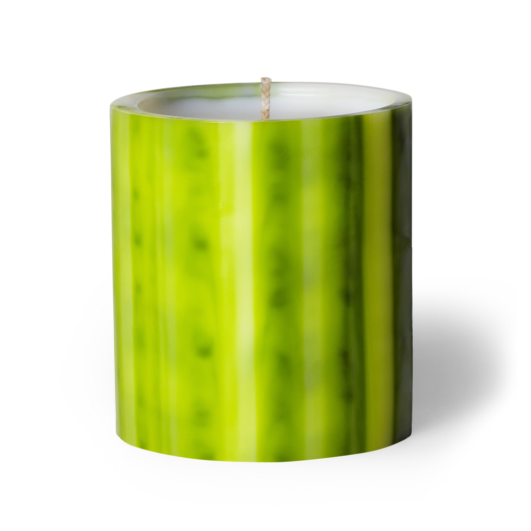 Experience the Chartreuse Artisanal candle by Le Feu De L'eau, blending cassia bark, sandalwood, and frankincense for a mystical sensory journey. Crafted underwater from wax, each candle is a unique creation. Hand-poured in LA with cocunut wax and natural fragrance. Enjoy 75 hours of burn time. Image of candle in lime green colored wax vessel.
