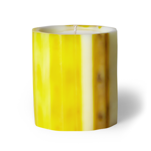 Invigorate your senses with Citron scented artisanal candle. Grapefruit, apple, and bergamot—tangy grapefruit and clarifying apple welcome this new day. Crafted underwater from wax, each candle is unique. Hand-poured in LA with coconut apricot wax. Cruelty-free ingredients. Non-toxic. Enjoy over 75 hours of burn time. Image of citron scented candle in yellow wax vessel. 
